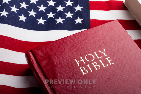 Holy Bible On An American Flag - Stock Photos | Pearl