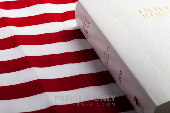 Holy Bible On An American Flag - Stock Photos | Pearl