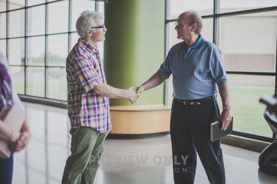 Hand Shake At The Entrance Of A Church - Stock Photos | Pearl