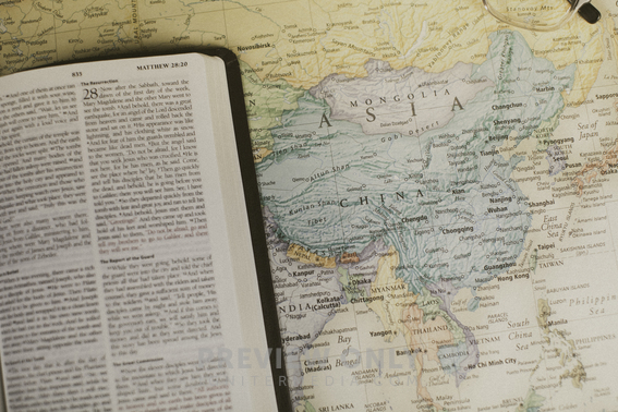 Bible On A Map Of Asia Stock Photos Pearl   Image