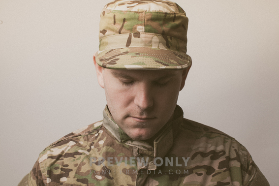 Soldier In Prayer - Stock Photos | Pearl