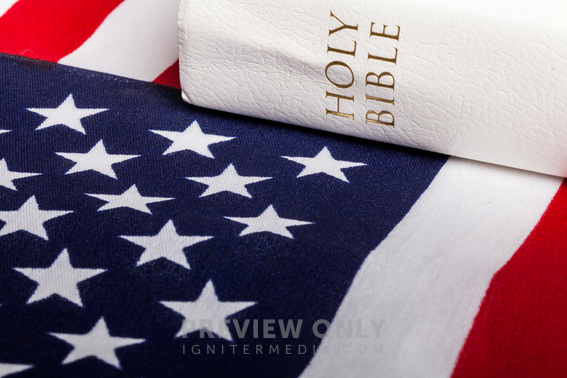 Holy Bible On An American Flag - Stock Photos | Pearl