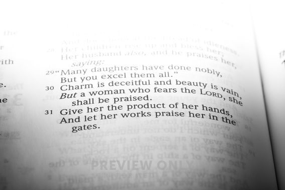 Bible Open To Proverbs 31:29-31. - Stock Photos | Pearl