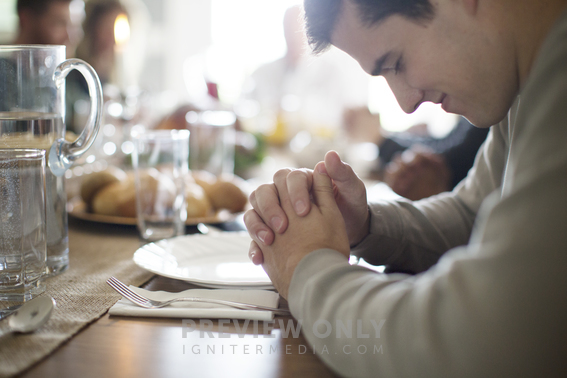 Prayers Around The Table At Thanksgiving - Stock Photos | Prixel Creative