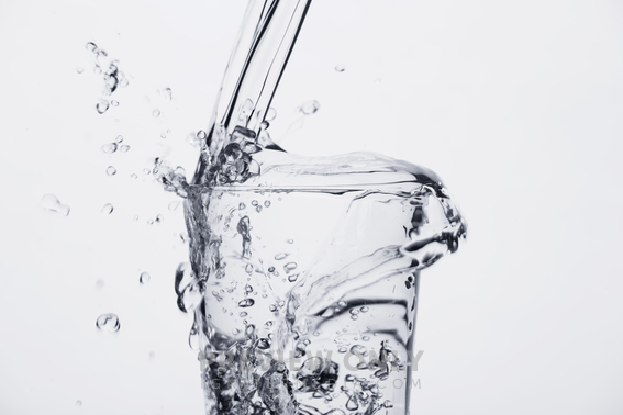 Glass Cup Overflowing With Fresh Water. - Stock Photos | Prixel Creative