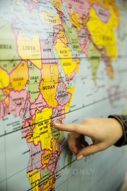 Finger Pointing To A Map Of Africa - Stock Photos | Prixel Creative