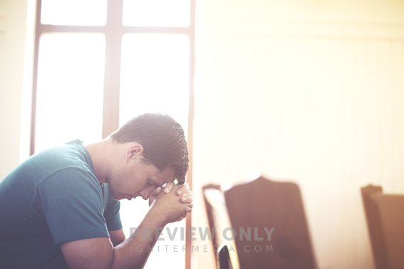 Man With Clasped Hands And Bowed Head Praying In A Church Pew. - Stock ...