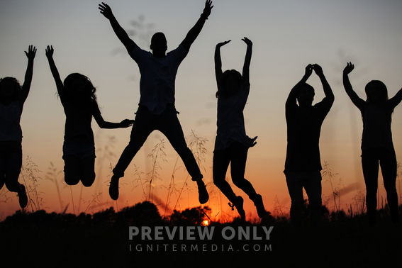 Silhouettes Of People Jumping At Sunset. - Stock Photos | Prixel Creative