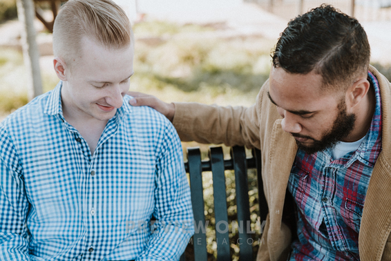 Two Men Sitting On A Park Bench Praying - Stock Photos | The Visual Folk