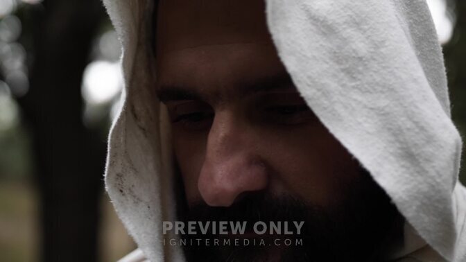 The Face Of Jesus Christ Wearing White Cloak And Hood In Cinematic Slow ...