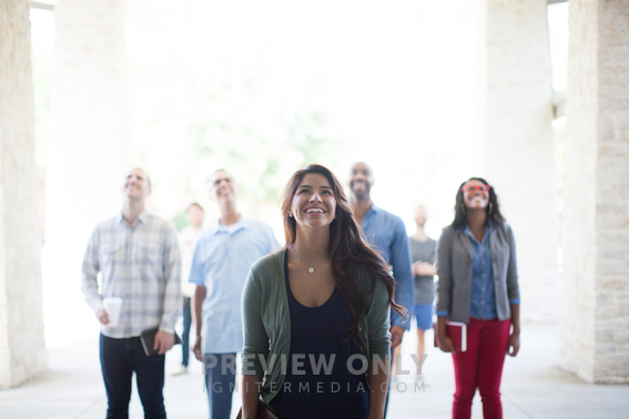 Group Of People Looking Up To God Holding Bibles - Stock Photos | Pearl