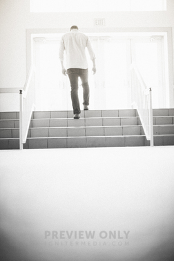 Man Walking Up Stairs Exiting A Church - Stock Photos | Pearl