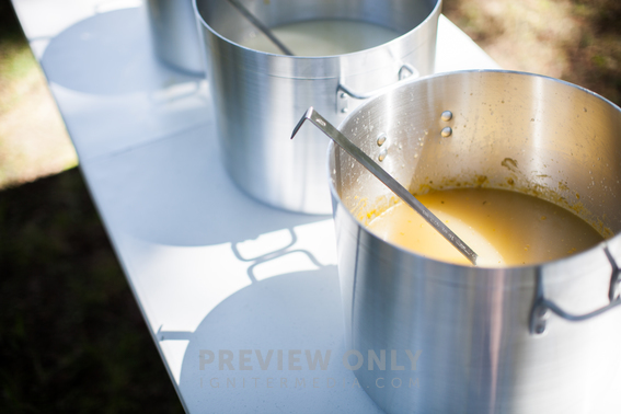 Stock Pots Of Soup On Tables At A Soup Kitchen - Stock Photos | Pearl